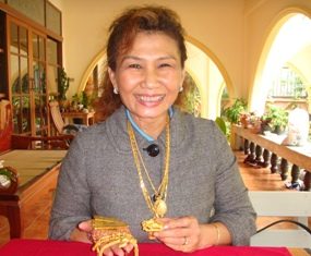 Nittaya Patimasongkroh, owner of Trathong gold shop, says gold prices are at record highs.